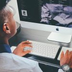man working on computer