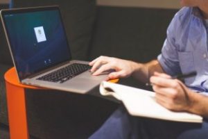 working on laptop